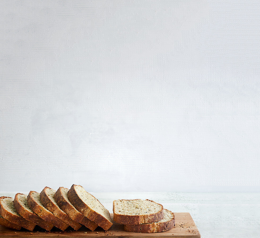 Spelt bread, sliced on a wooden board