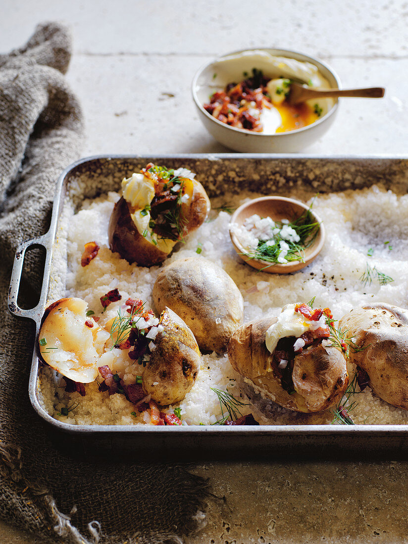 Salt and vinegar roast potatoes with bacon and dill butter