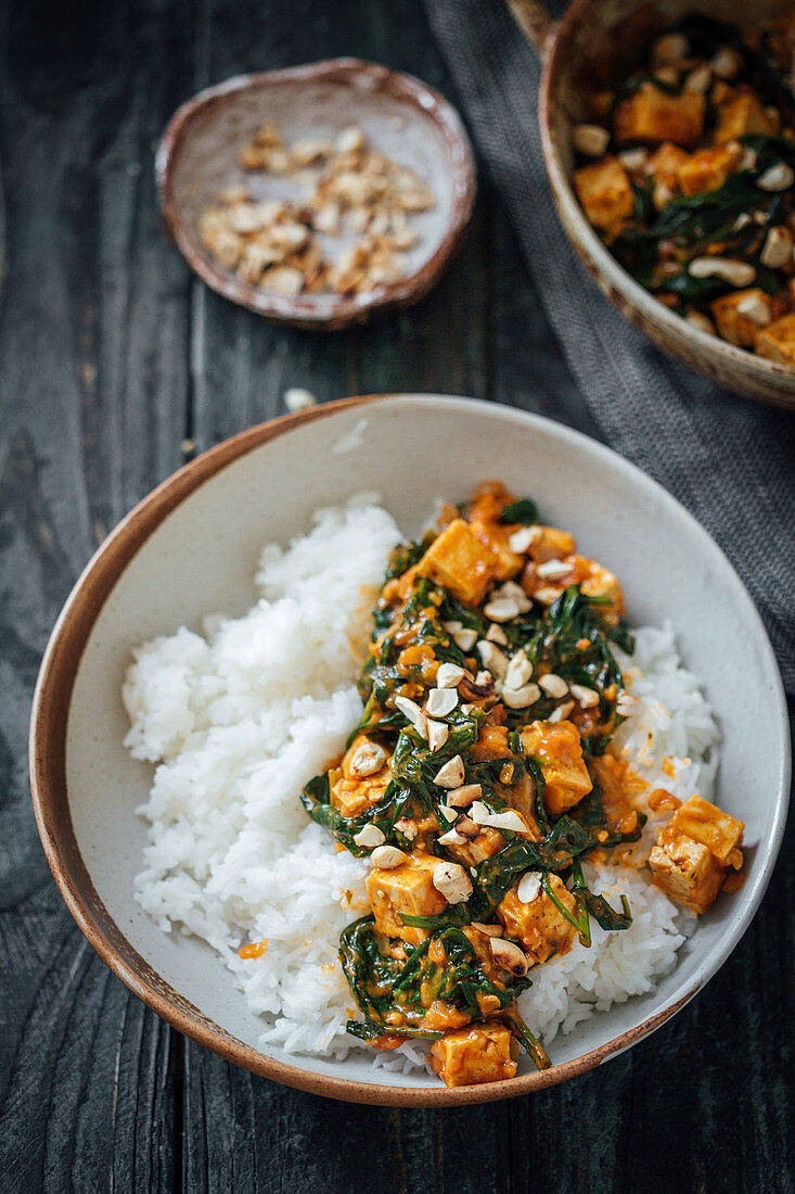 Tofu spinach curry with basmati rice and cashews