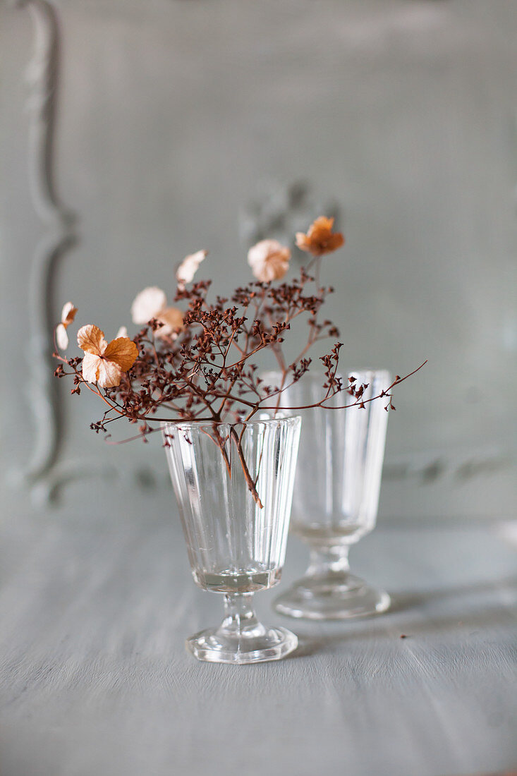 Dried flowers in wine glasses