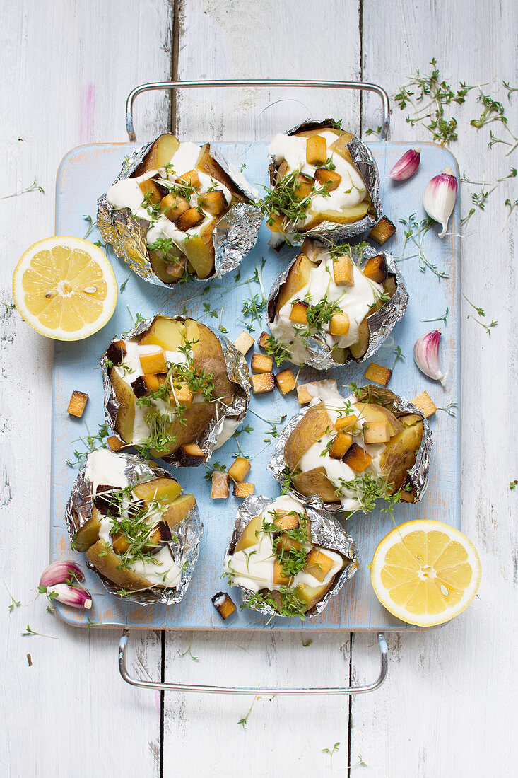 Vegan baked potatoes with soy yogurt and smoked tofu