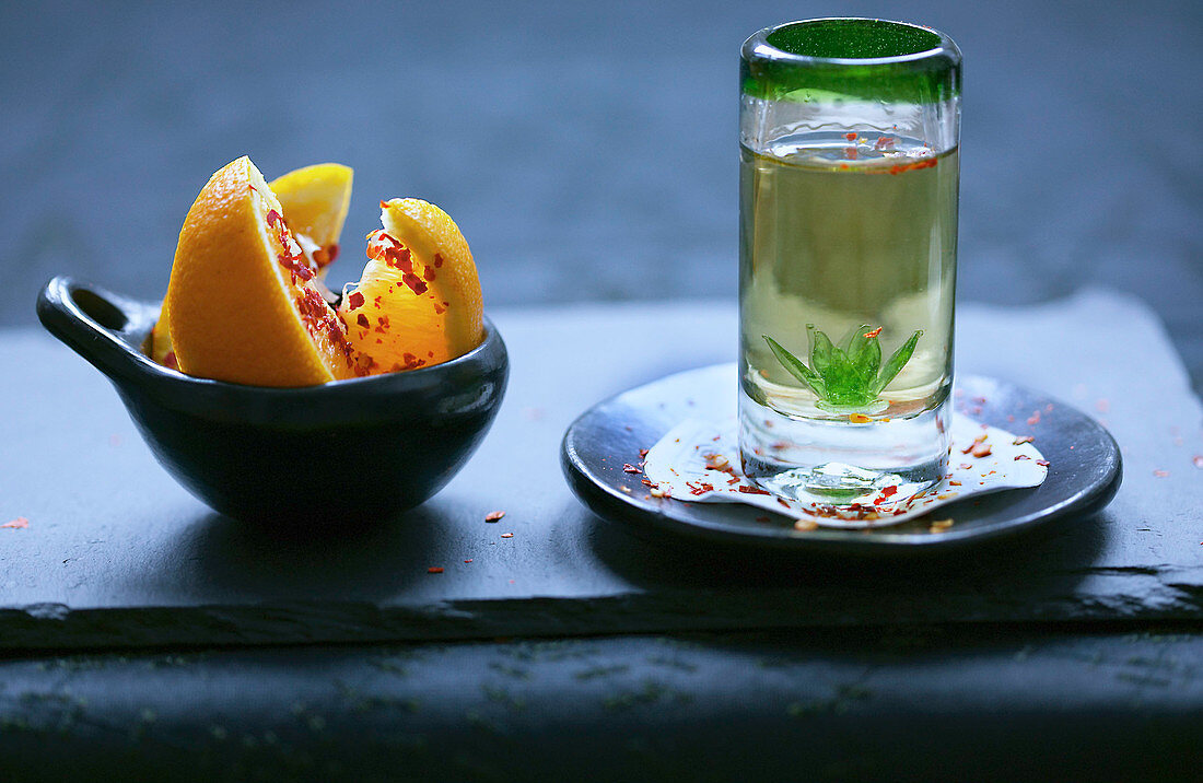 Mexican tequilla shot with chilli oranges