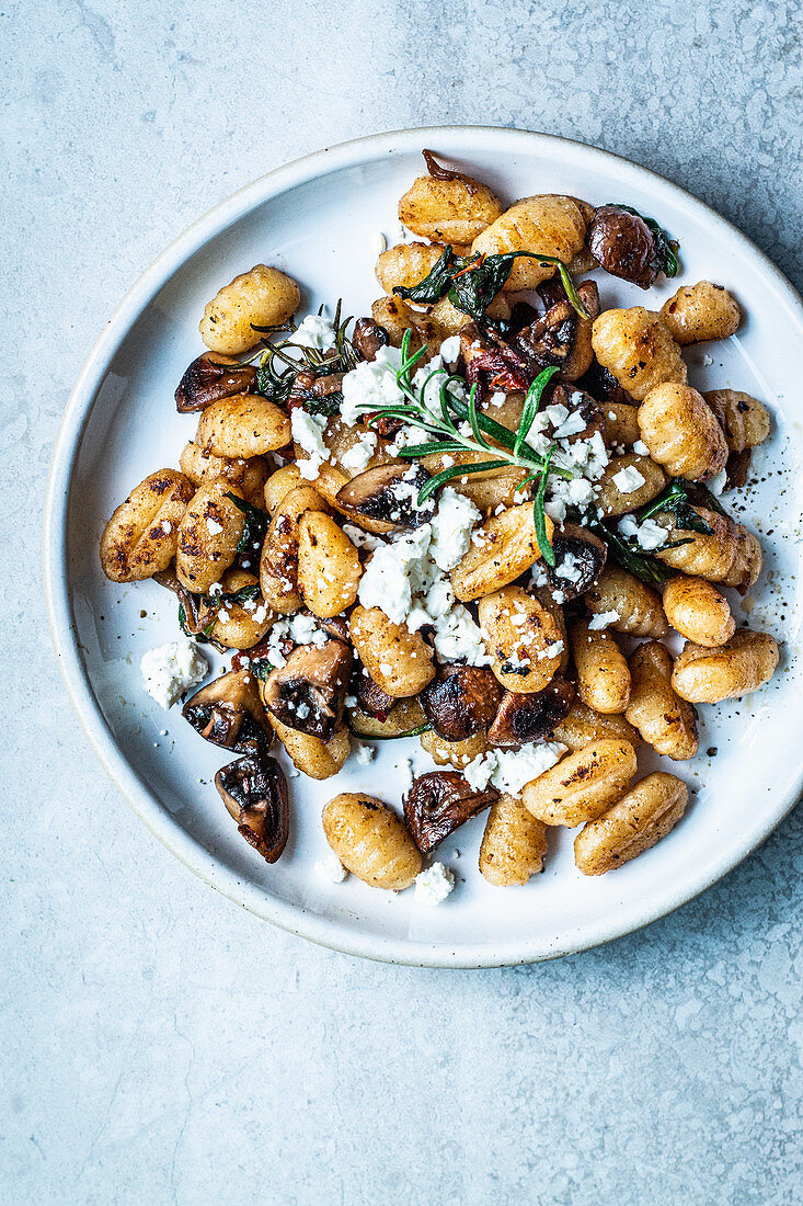 Gnocchi with mushrooms, feta and herbs