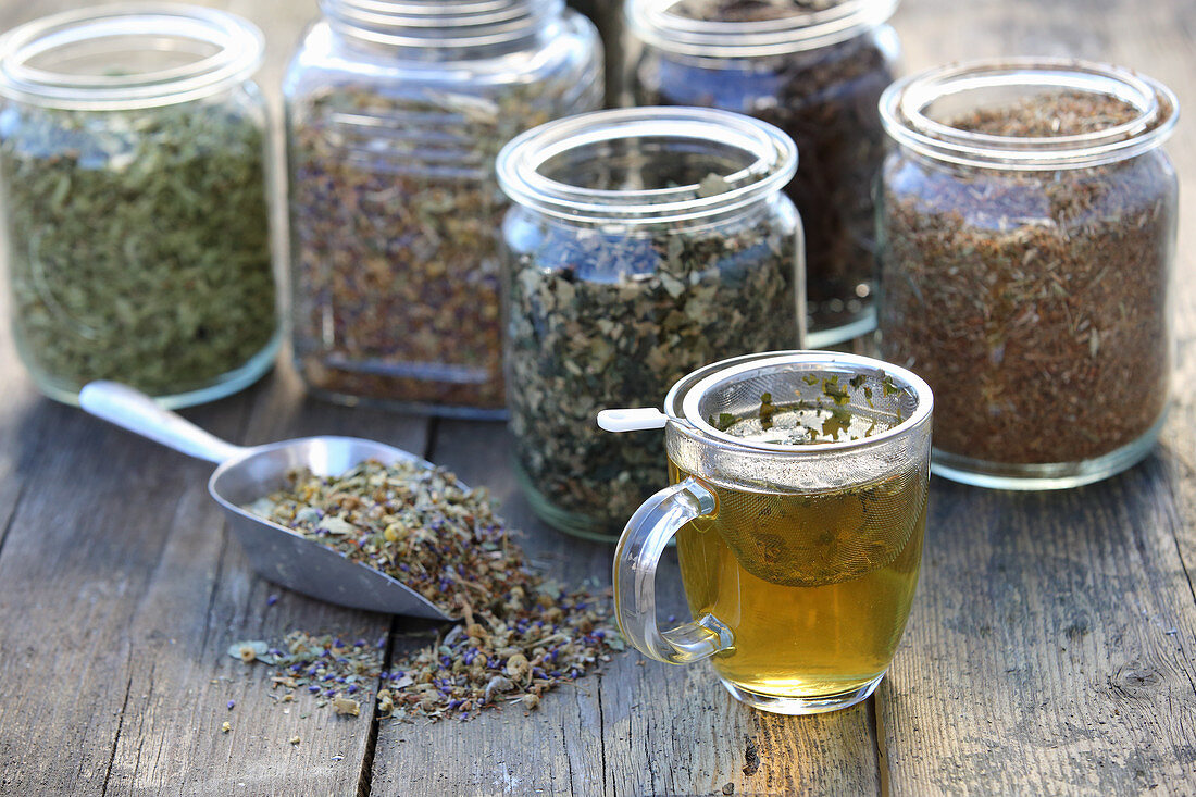 Various herbal and flower teas in glasses