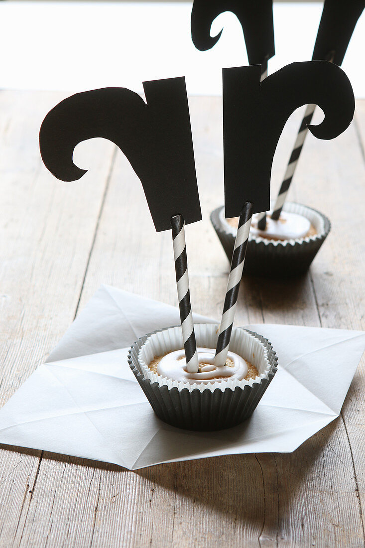 Boot decorations in black-and-white Halloween muffins