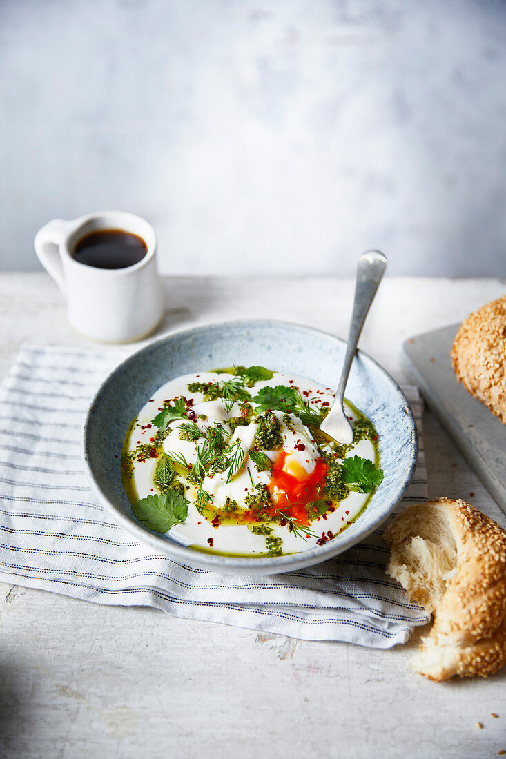 Turkish eggs with red and green butter