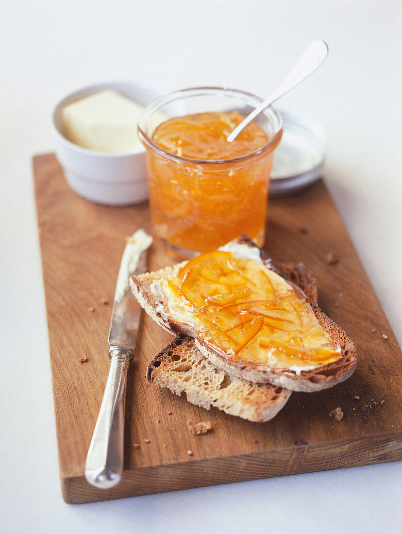Sourdough bread with butter and orange jam