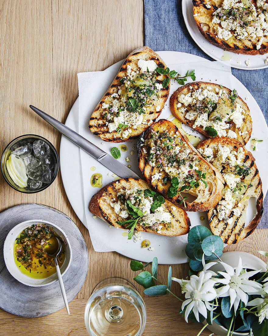 Grilled bread with thyme-infused ricotta, preserved lemon salsa