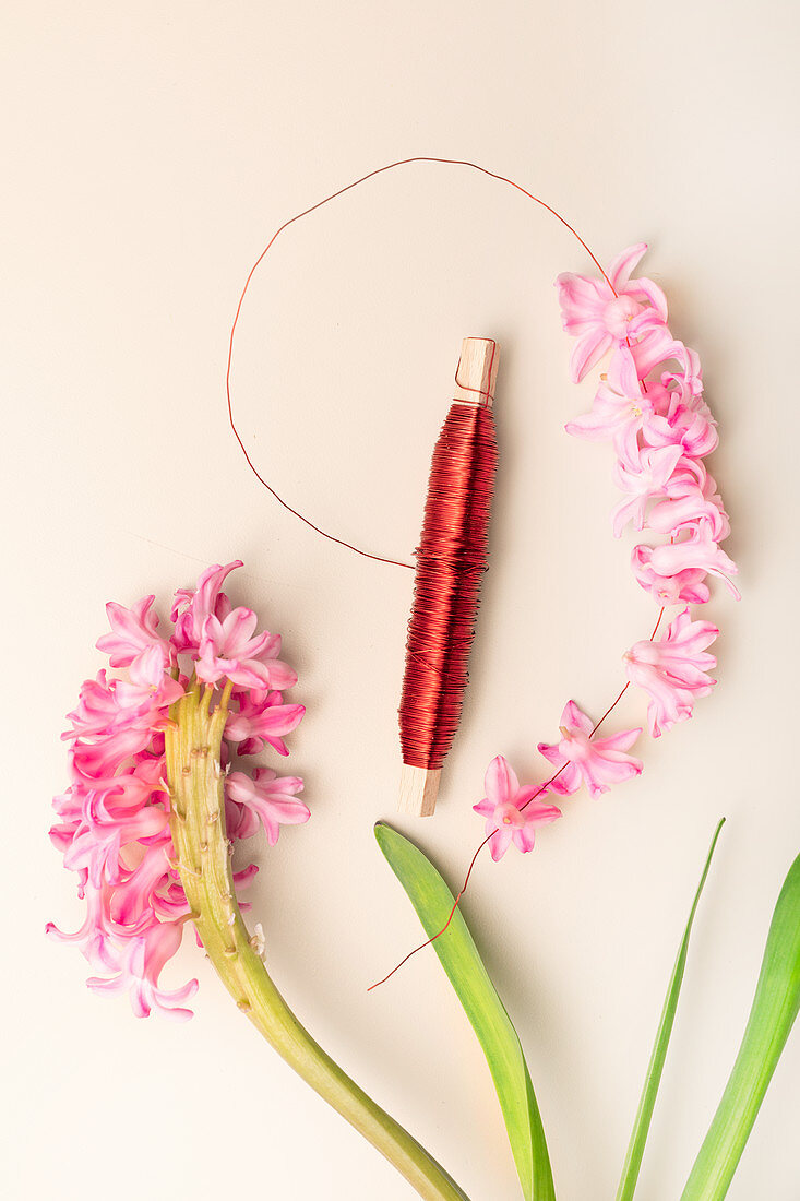 Threading hyacinth florets onto fine wire