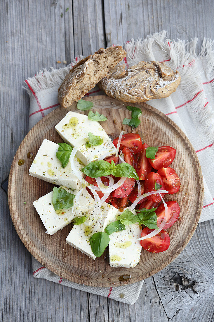 Cream cheese and tomatoes and homemade herb oil