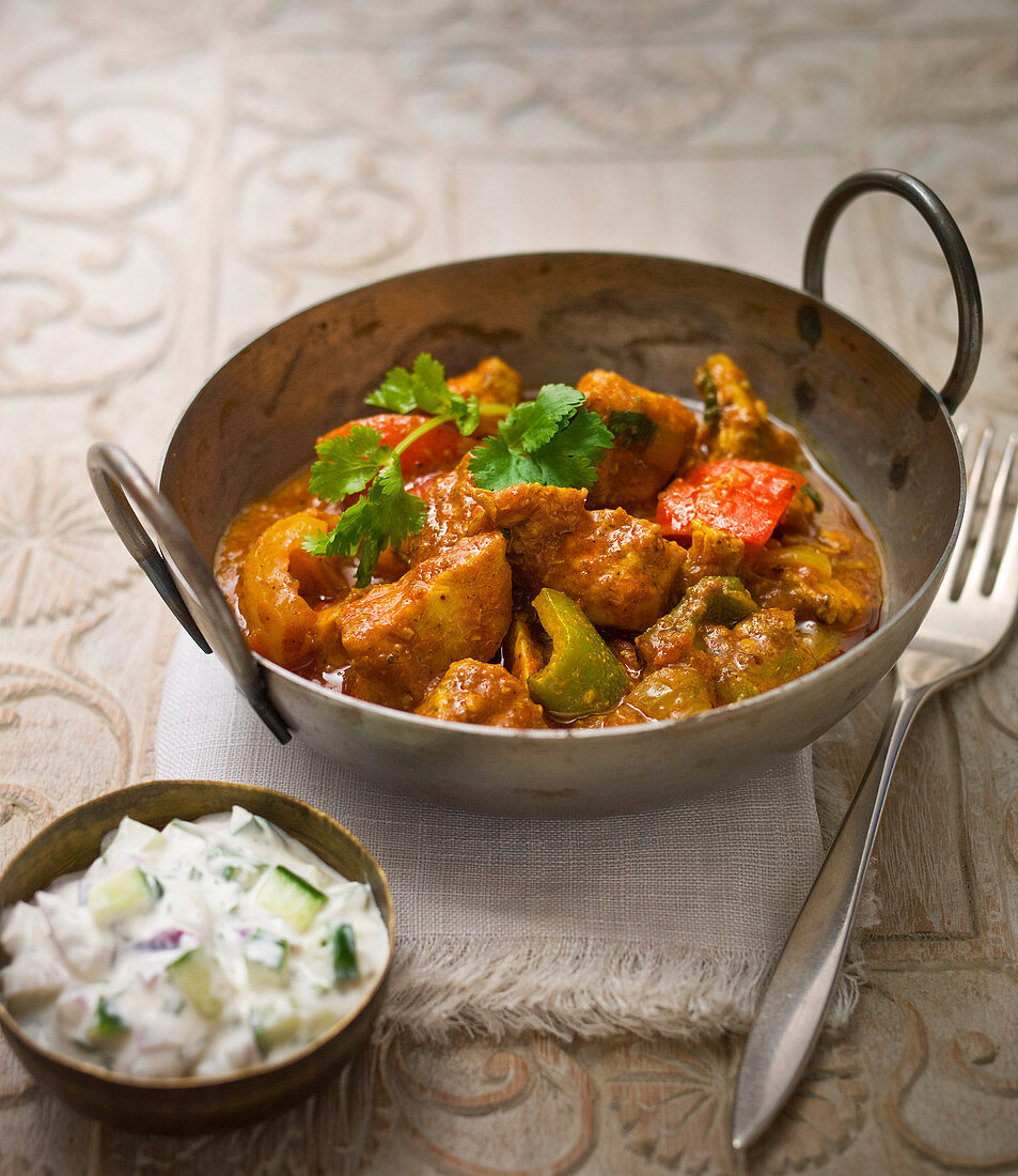 Chicken curry with red and green peppers and coriander