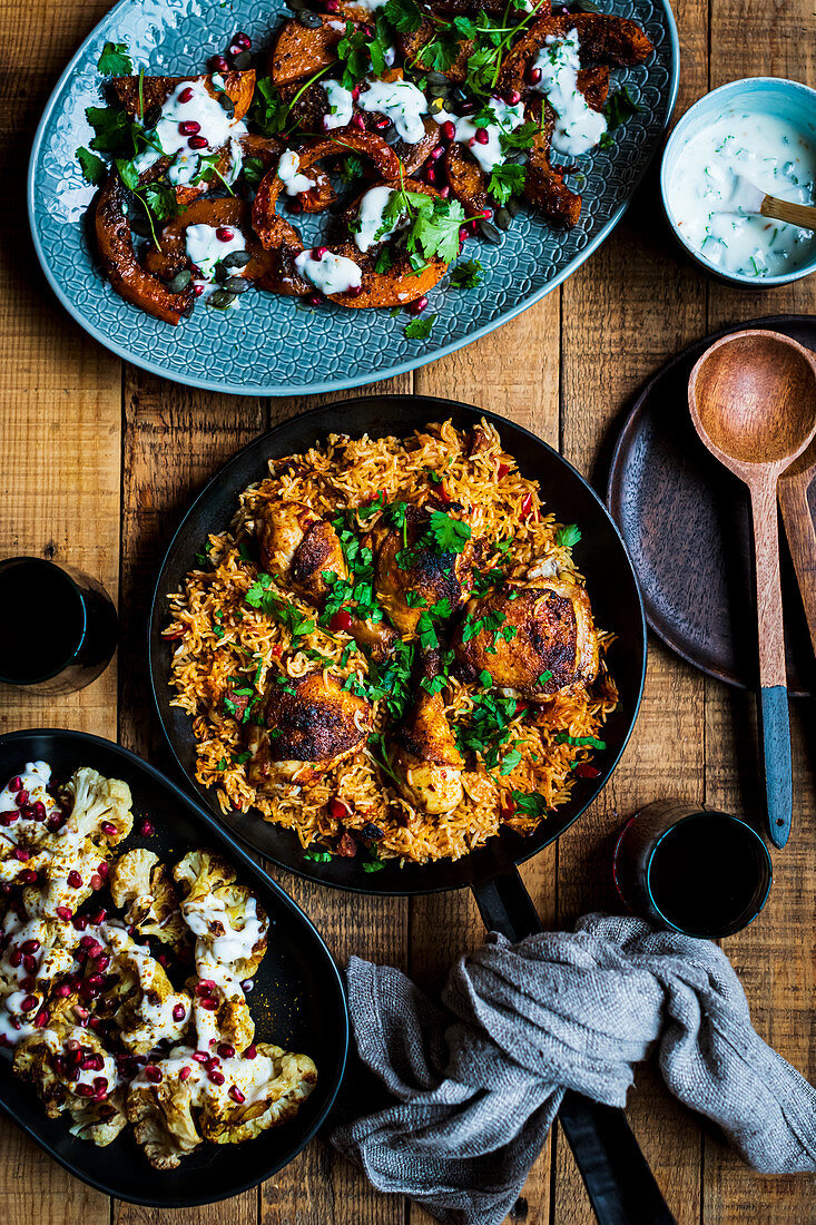 A Meal of Spanish Inspired Chicken cooked with Rice, Cauliflower and Roasted Butternut