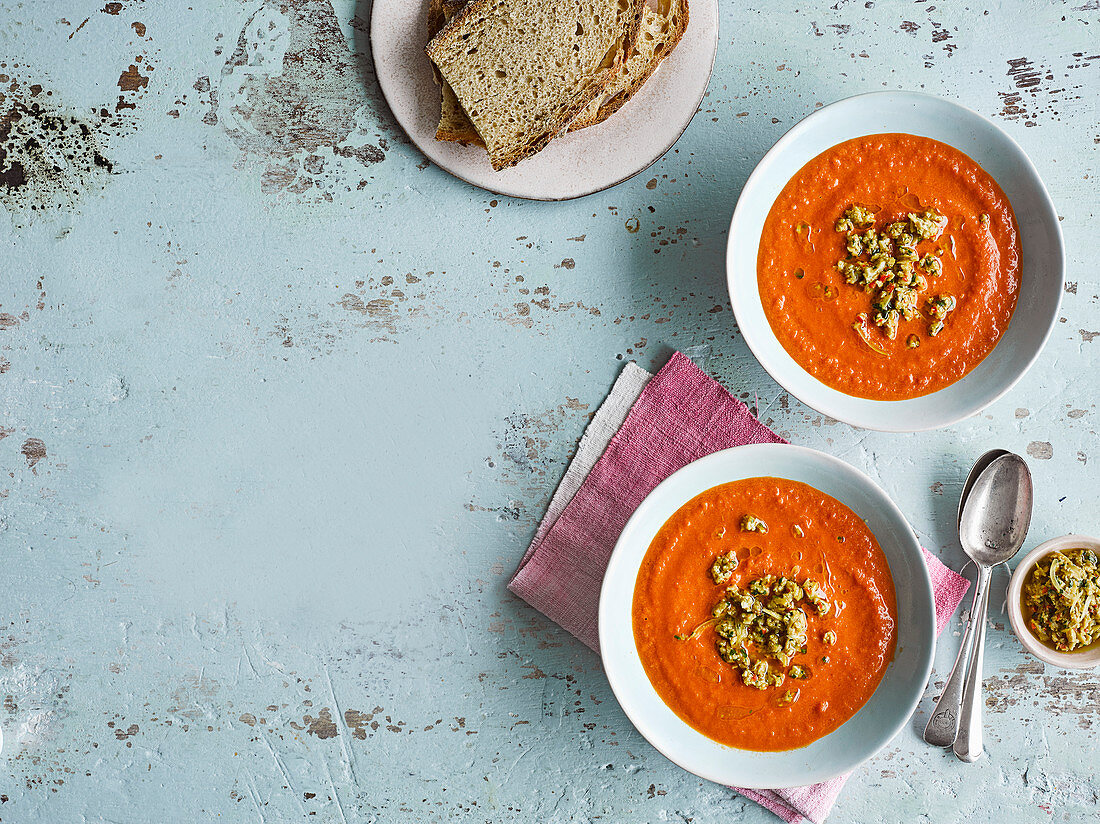 Smoky tomato soup with preserved lemon and green olive salsa