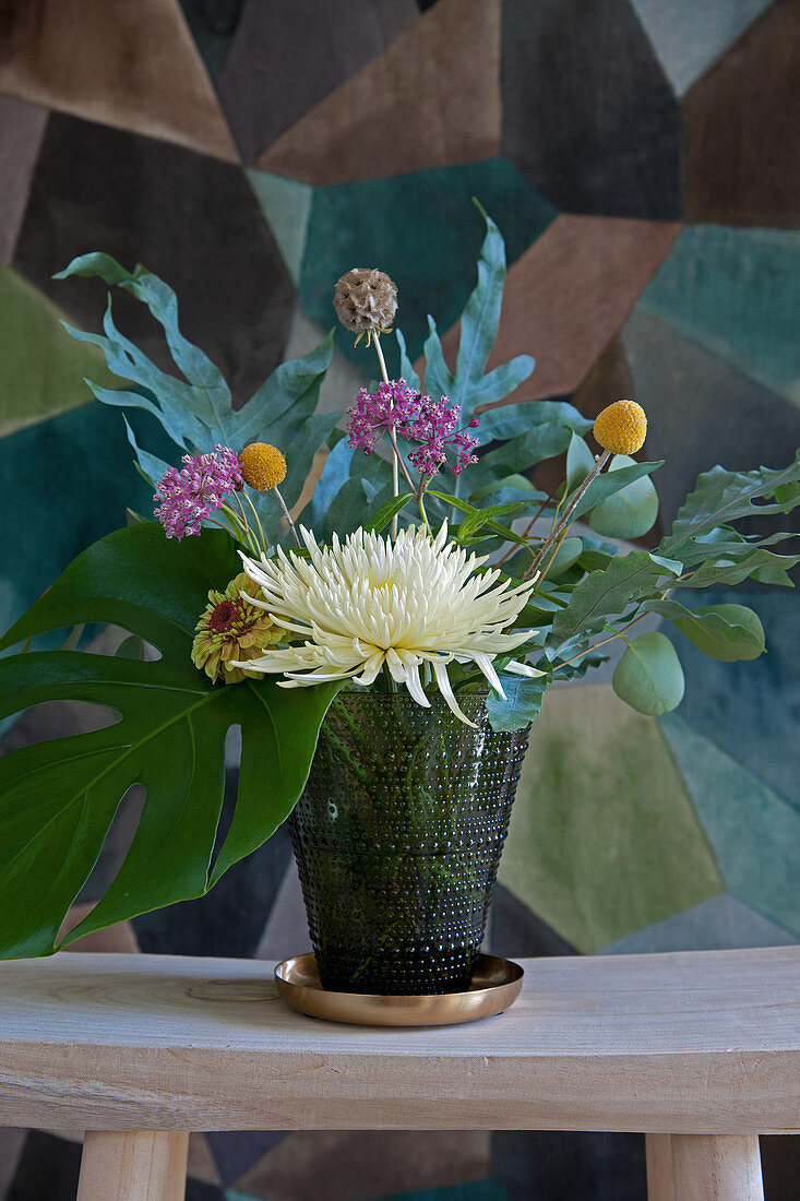Bouquet of chrysanthemums, yarrow, drumstick flowers, starflower pincushion, zinnia, Swiss cheese plant leaves and ferns