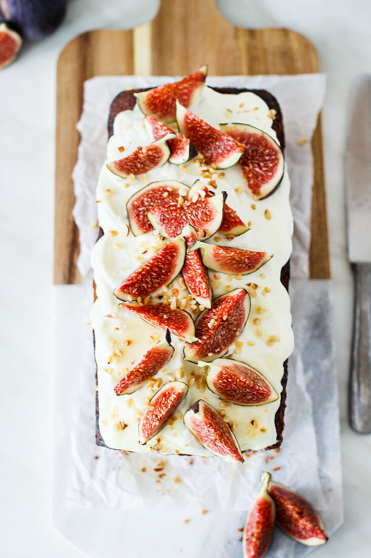 Honey cake with cream cheese frosting and figs