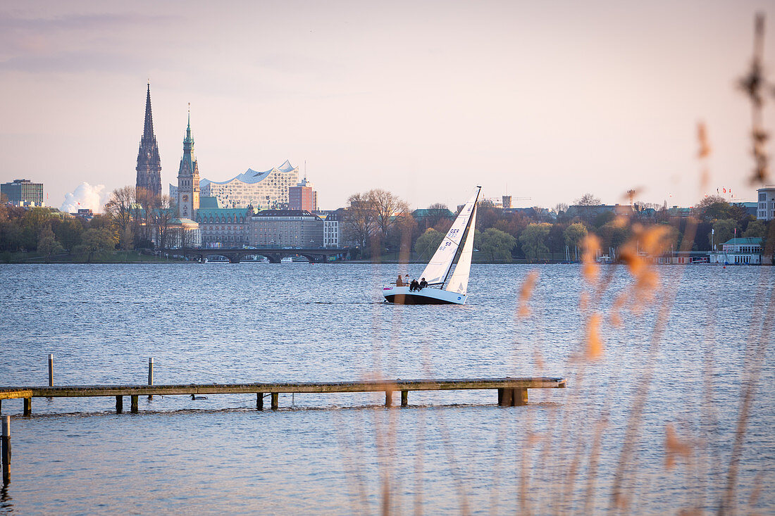 A view of the Hamburg skyline with sailing boats in the foreground, Germany