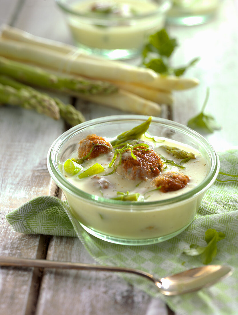 Asparagus soup with almond balls