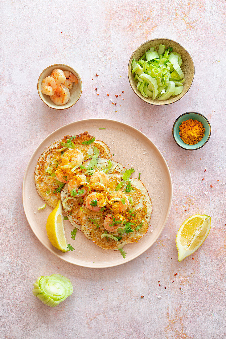 Uttapam (fermented rice pancakes, India) with prawns