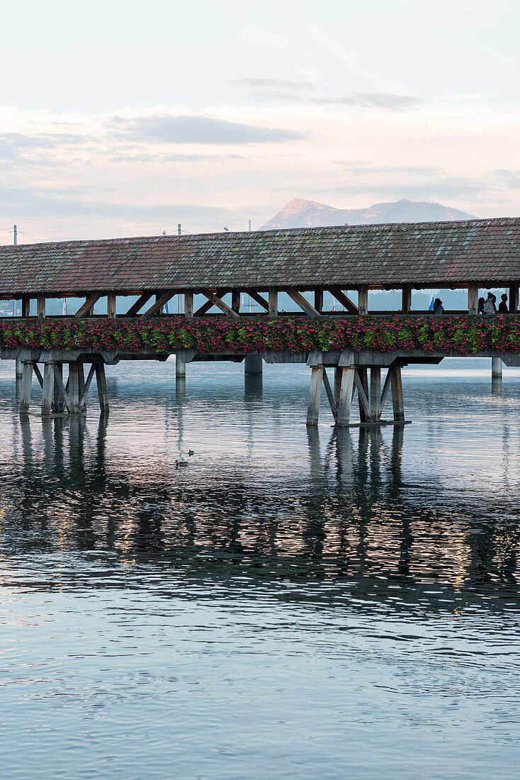 The Kapellbrücke (Chapel Bridge) over the river Reuss, Lucerne, Switzerland