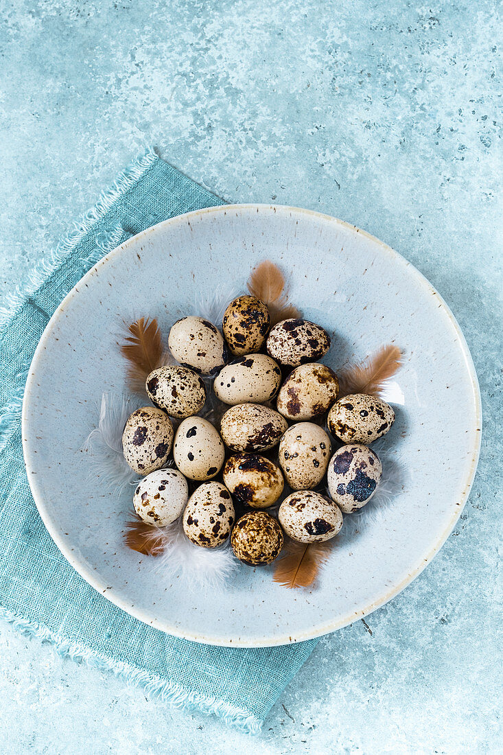 Fresh quail eggs in a bowl