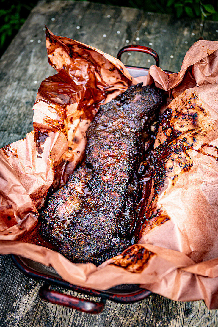 Grilled beef ribs on a piece of paper