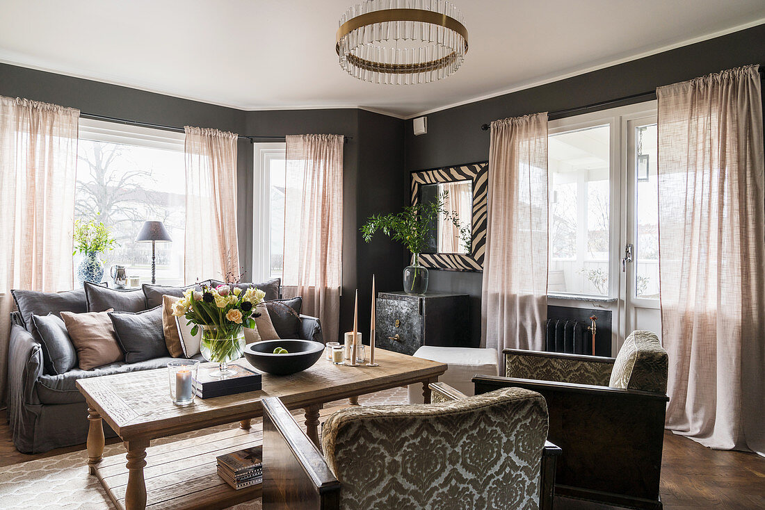 Classic living room in muted shades with grey walls