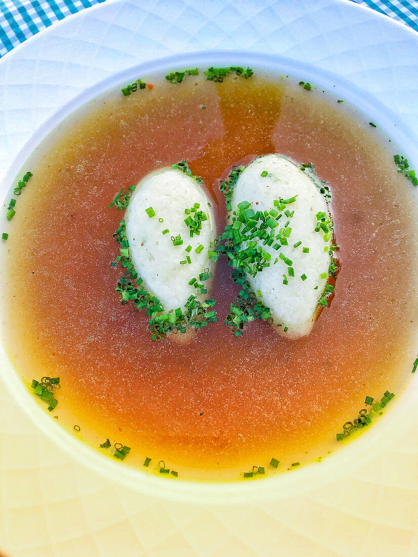 Semolina dumpling soup with chives