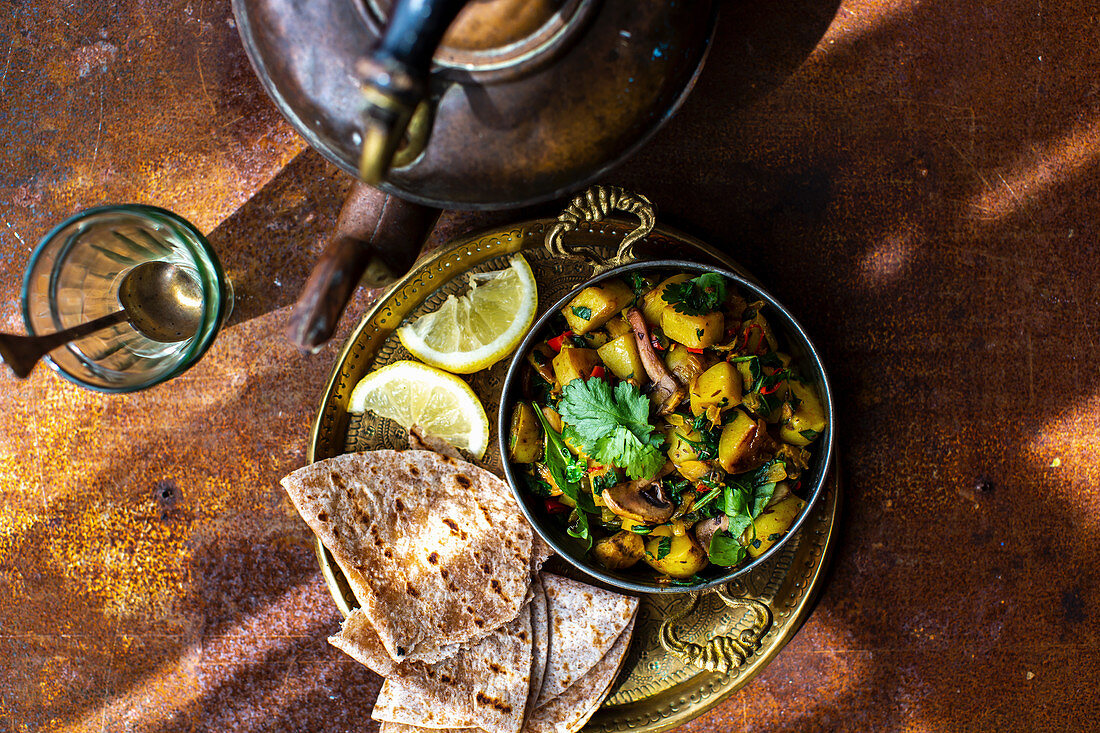 Indian potato, spinach and mushroom curry