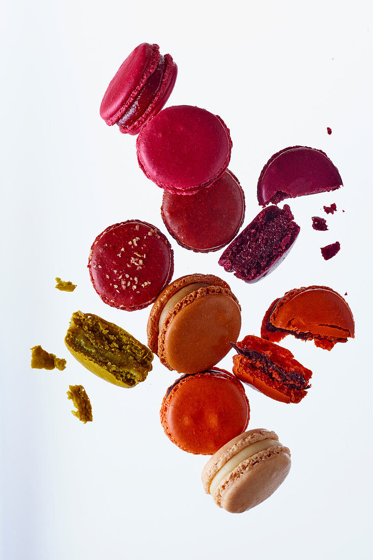 Various different coloured macaroons, some broken