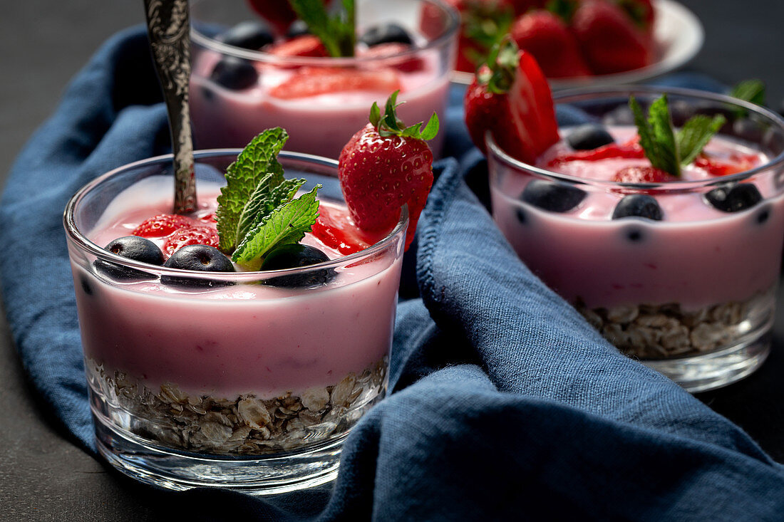 Homemade yogurt with strawberries, blueberries and cereals