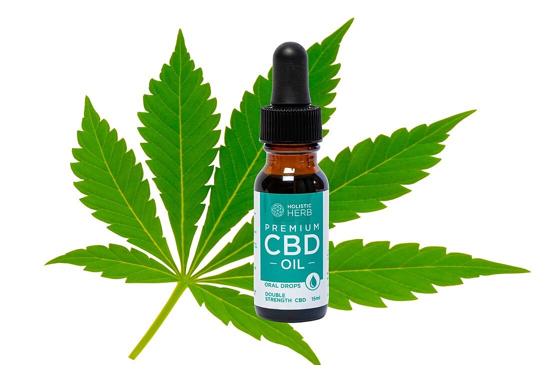 CBD oil and cannabis leaf