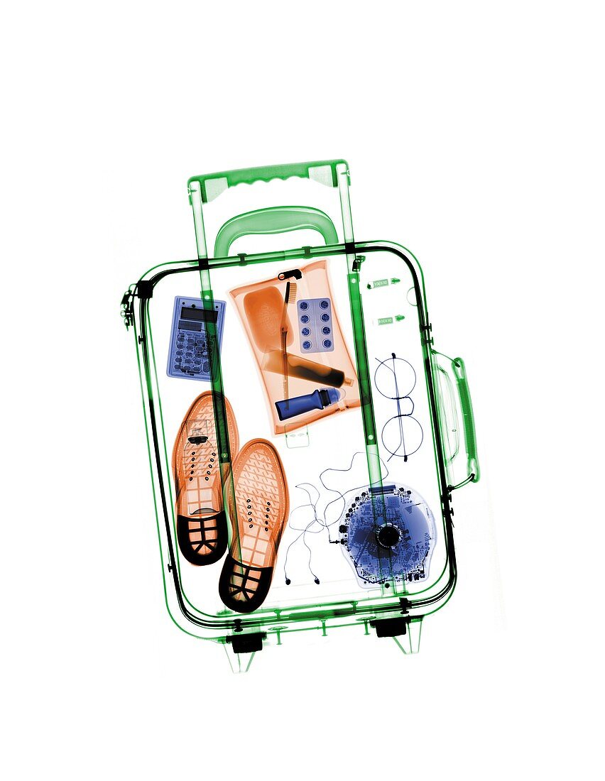 Airport case with various items, X-ray