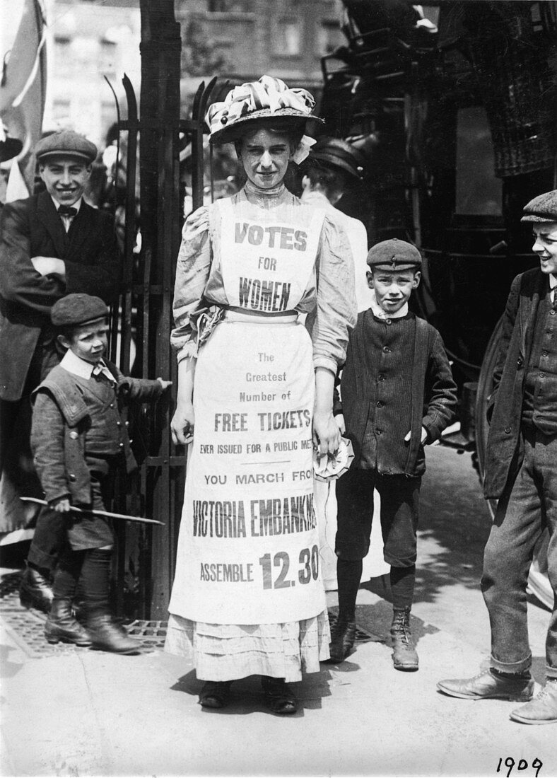 Suffragette advertising a march, Strand, London, c1909