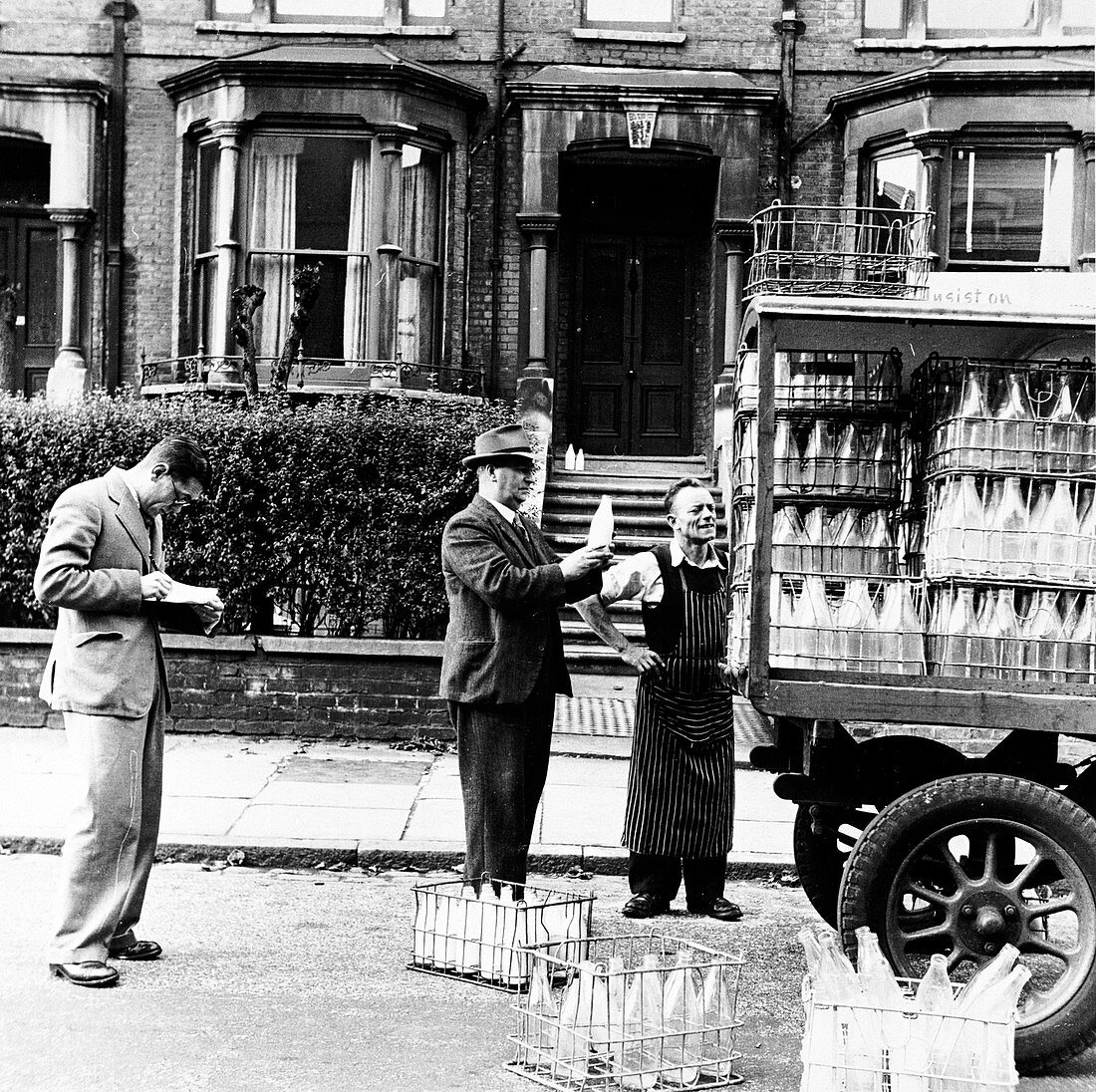 A milkman on his rounds in London, c1950s