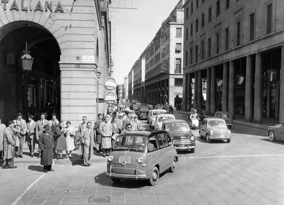 Fiat 600 Multipla leading a procession of Fiats, Italy