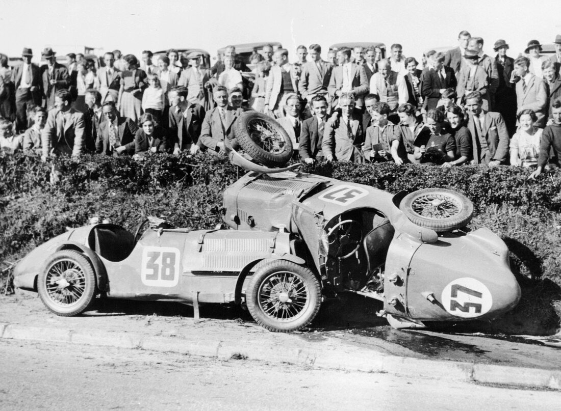 Two crashed cars from the Singer Nine team, 1935