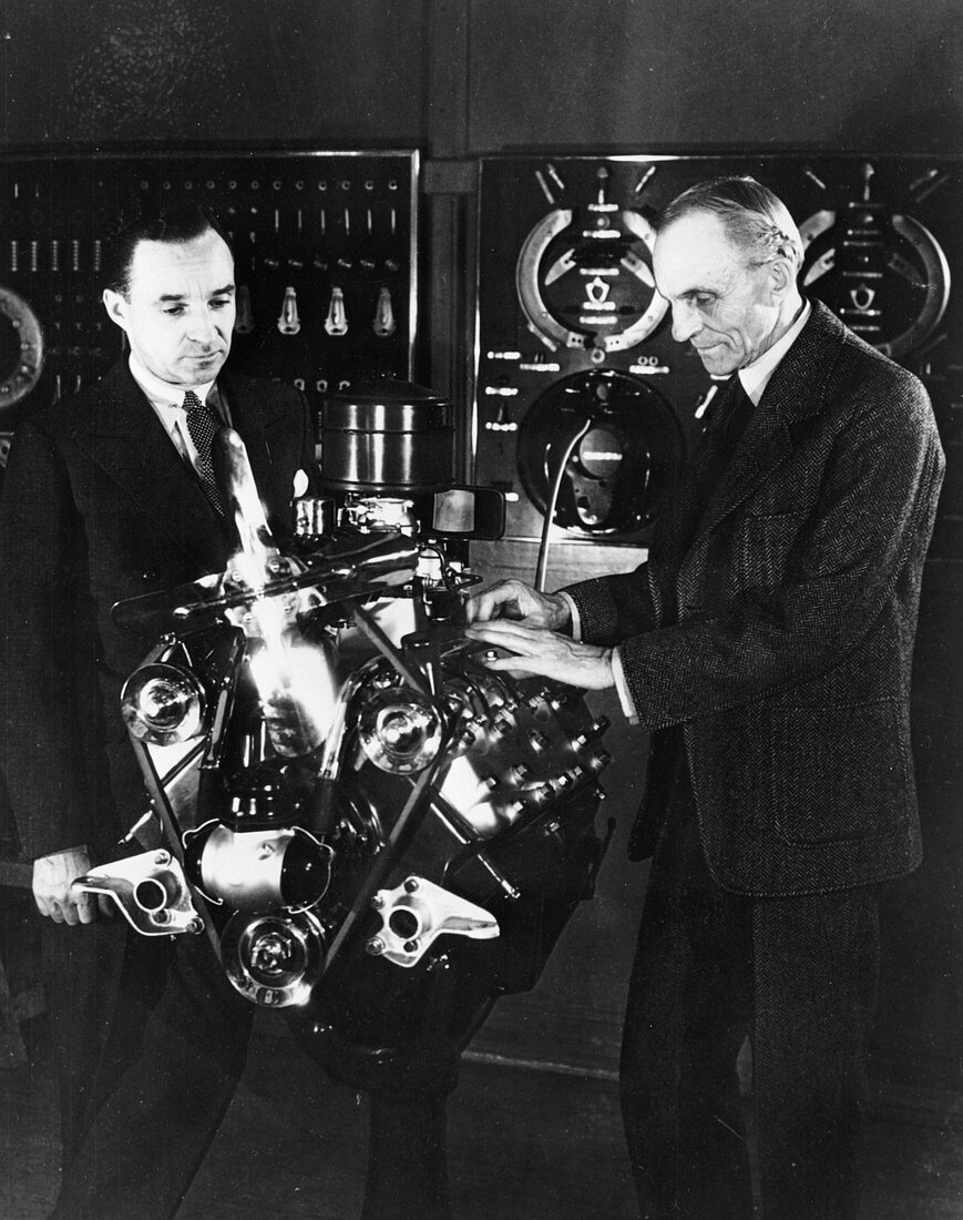 Henry and Edsel Ford with a Ford V8 engine