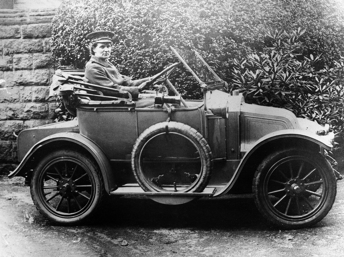 Woman in a 1911 convertible Renault AX, c1911