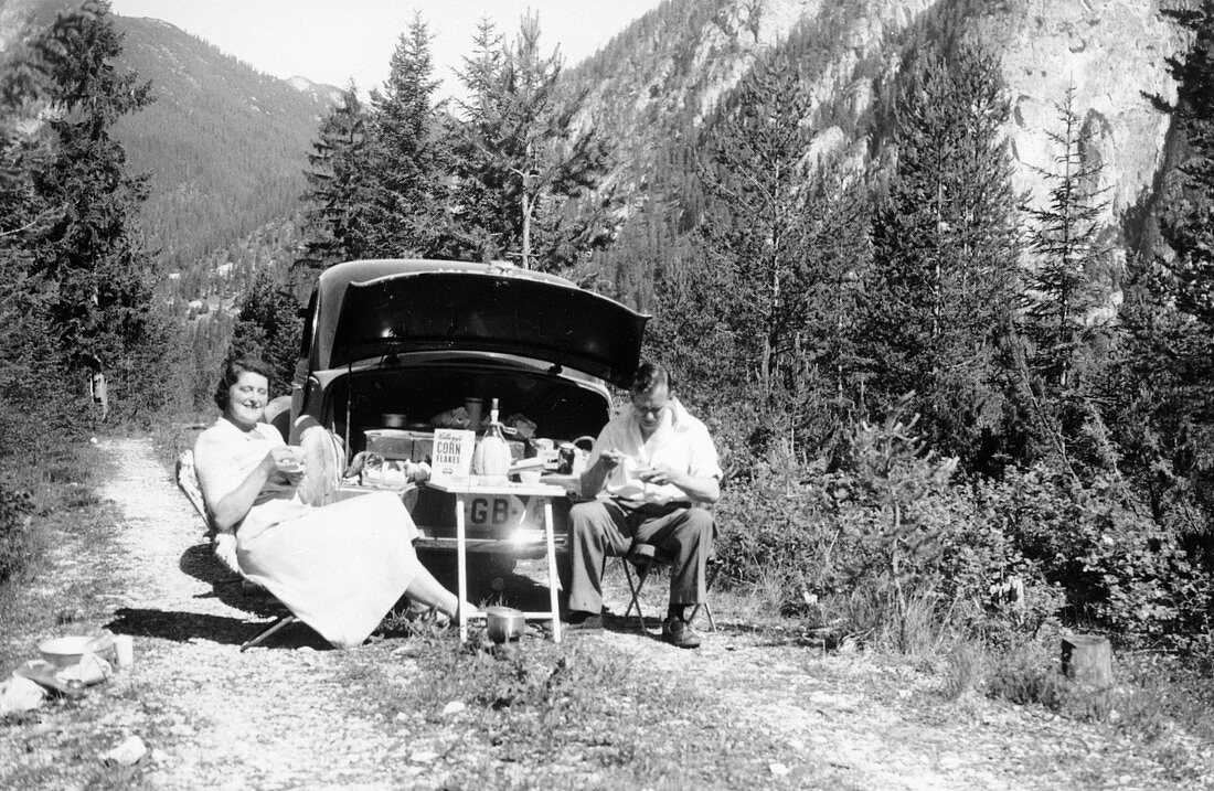 Couple with Vauxhall Wyvern enjoying a picnic, c1950