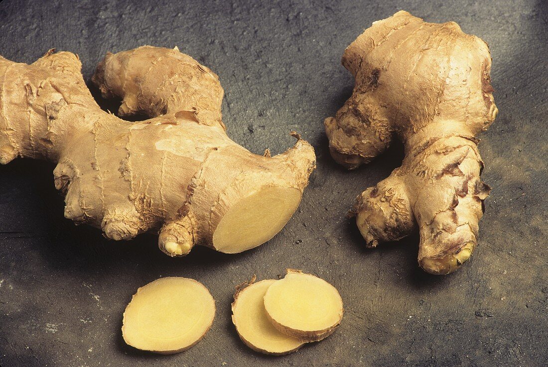 Two Ginger Roots; One Partially Sliced