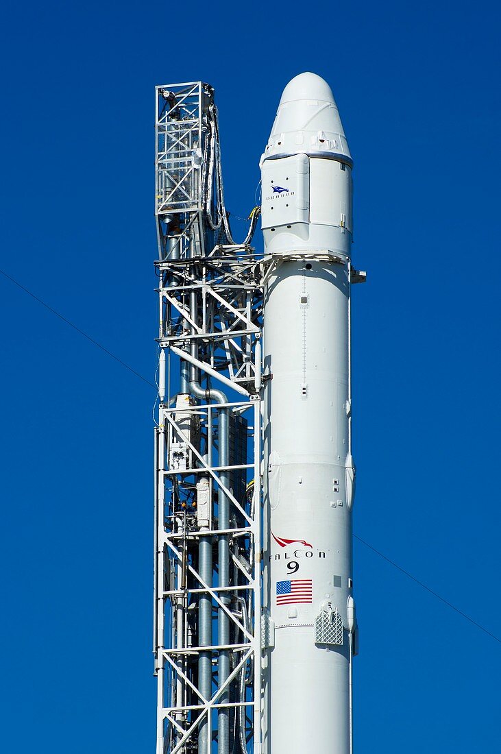 SpaceX Falcon 9 rocket on launch pad.