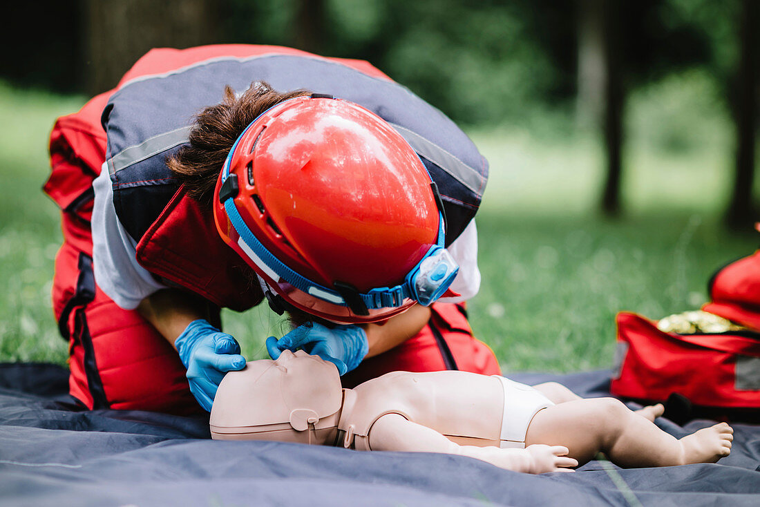 CPR training on baby dummy