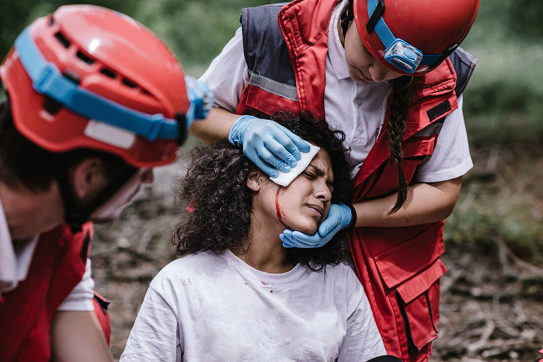 Rescue team treating injuries in the field