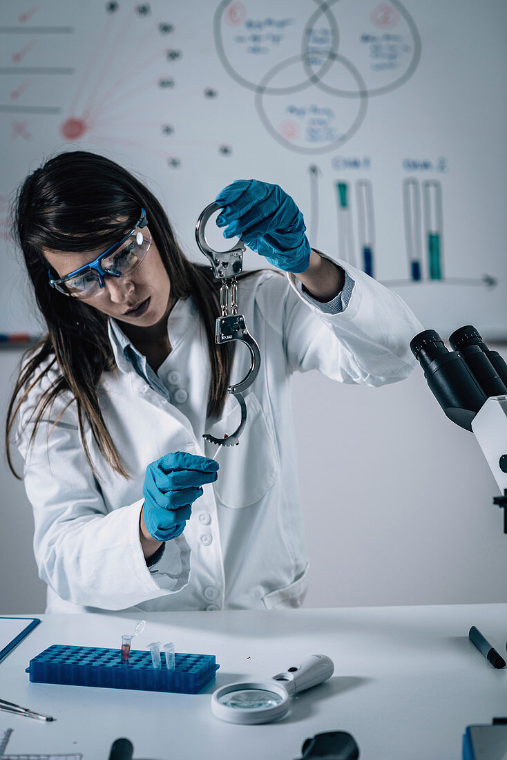 Forensics expert examining crime scene evidence