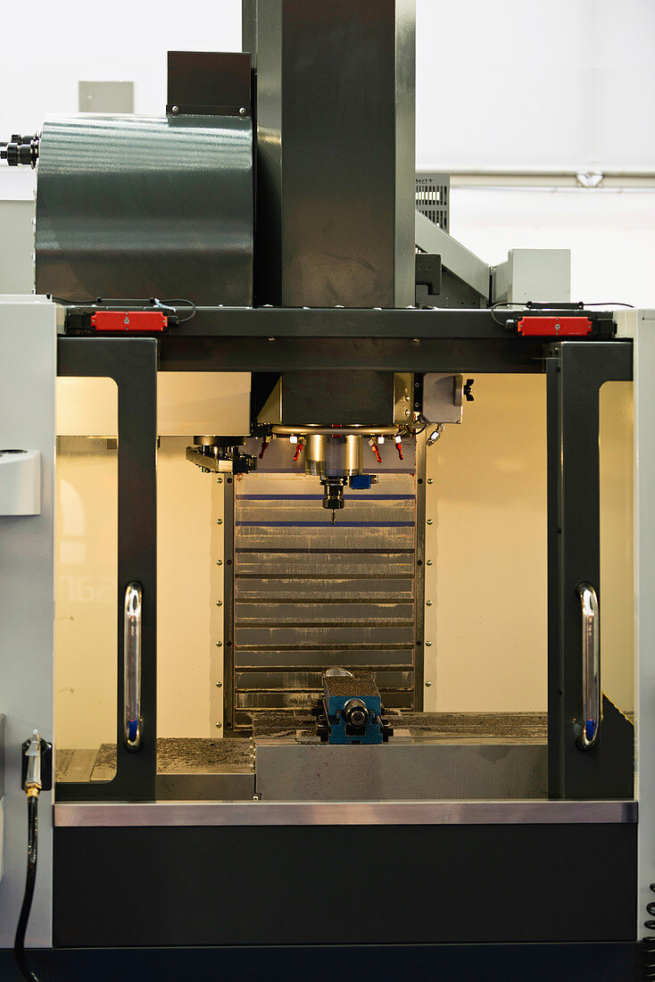 Automated metal processing lathe