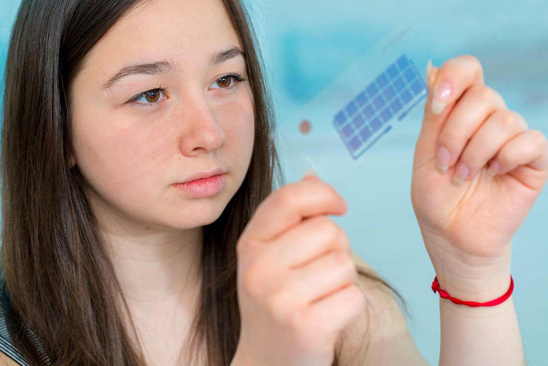 Girl working on electronics project