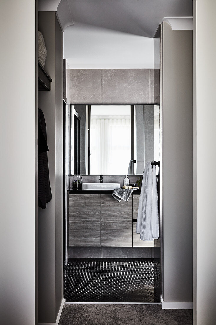 Floating washstand in bathroom