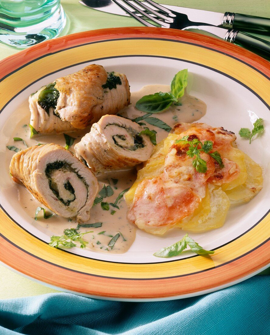 Turkey breast roulades stuffed with spinach & potato gratin