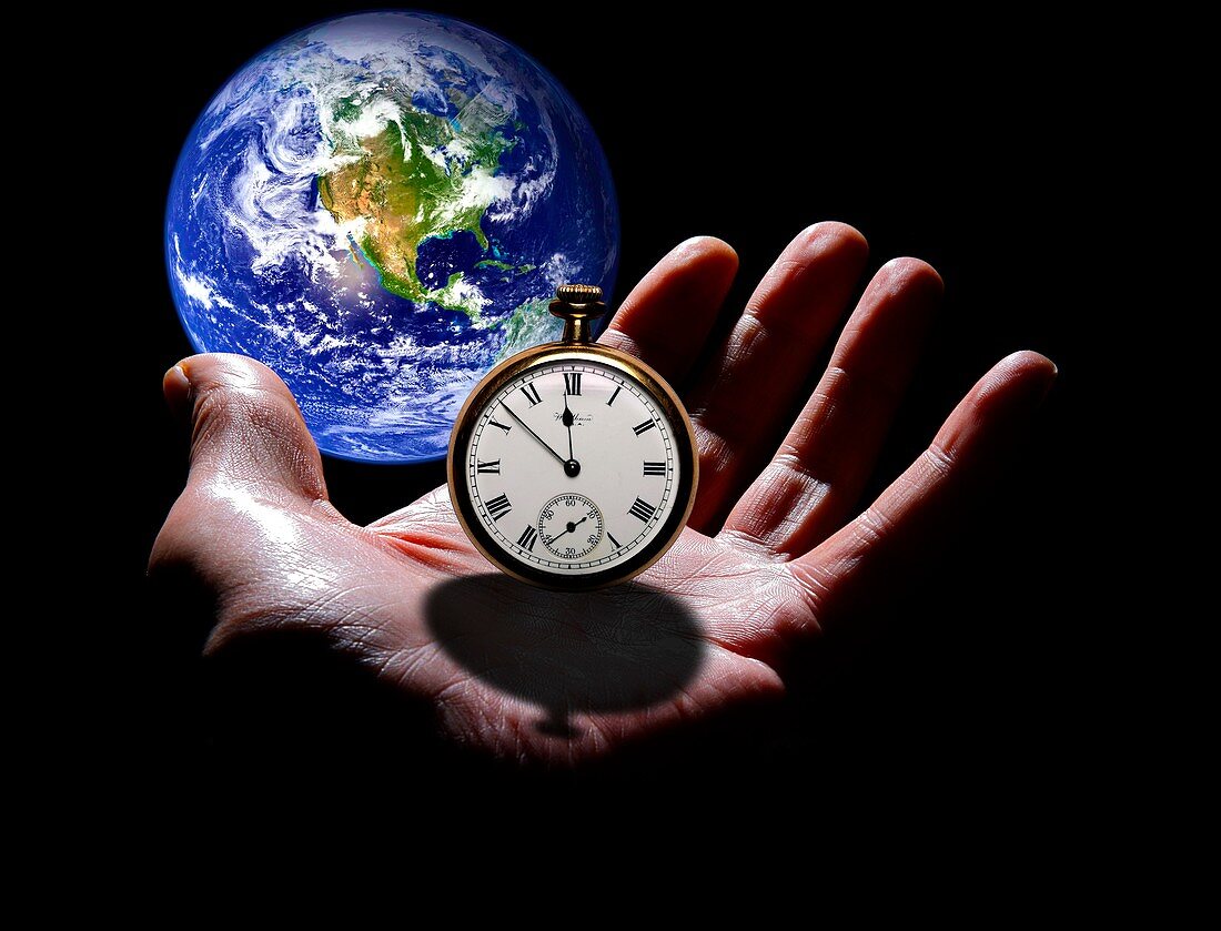 Earth with hand and stopwatch