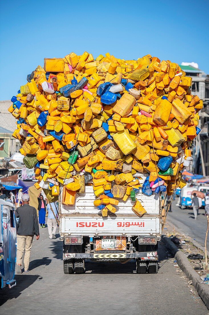 Truck overloaded with plastic containers